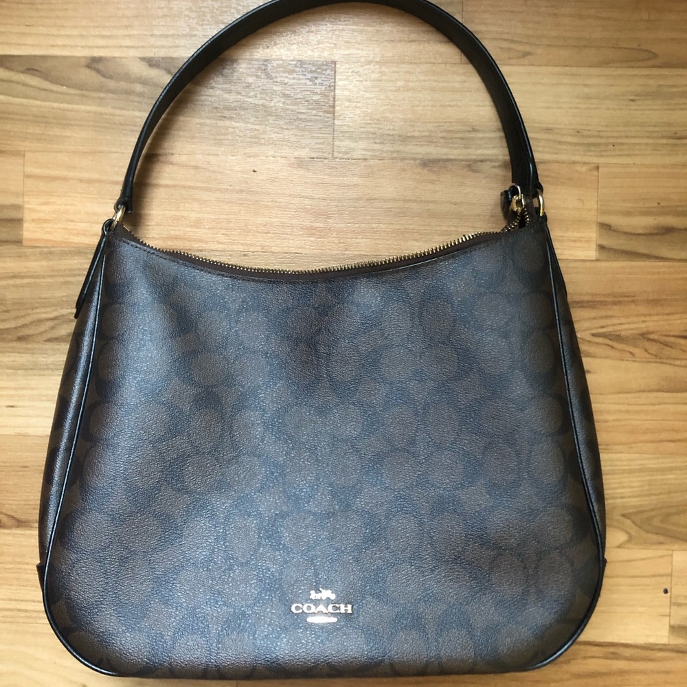 Coach zip shoulder bag in signature canvas